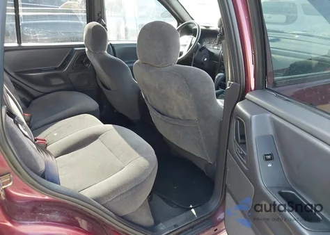 2001 Jeep Grand Cherokee Laredo z USA, uszkodzony, nr VIN 1J4GX48S11C642762